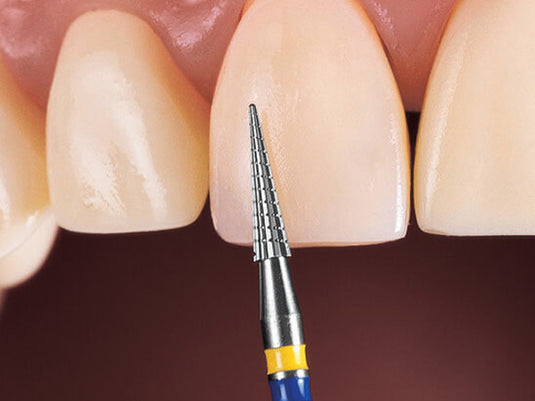 FS6Q tungsten carbide on a facial surface during composite finishing